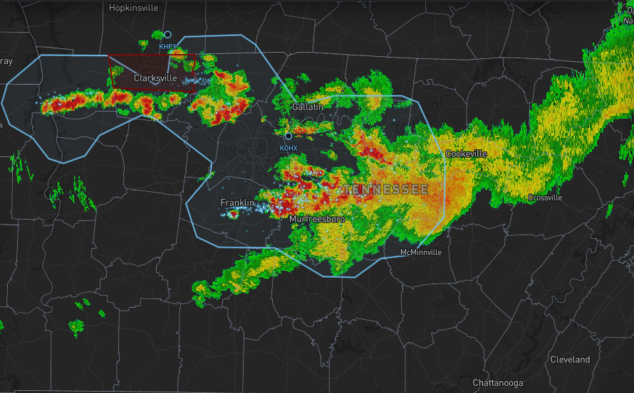 Live storm radar with National Weather Service warning and watch outlines drawn over central Tennessee.