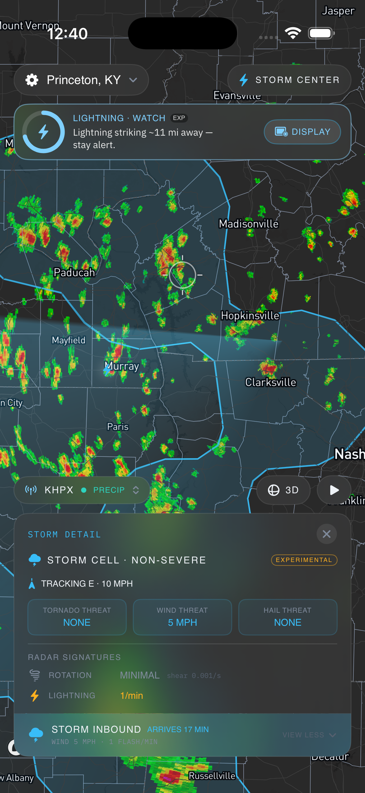 The home screen surfacing a storm-inbound heads-up: minutes to arrival, plain-language tornado, wind and hail threats, and the radar signatures underneath — rotation, lightning rate, and expected hail.